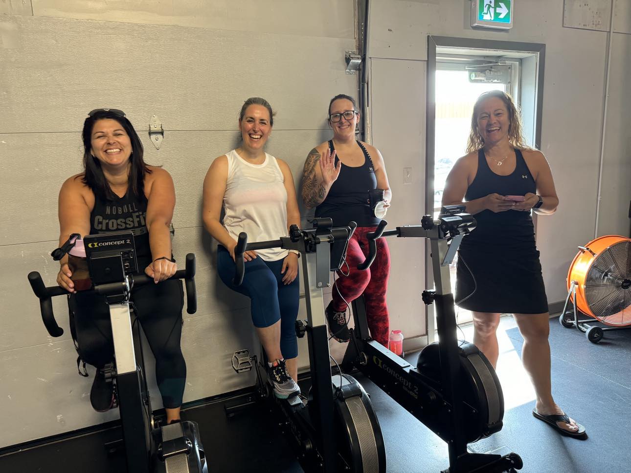 crossfit_rush crossfit rush women on exercise bikes